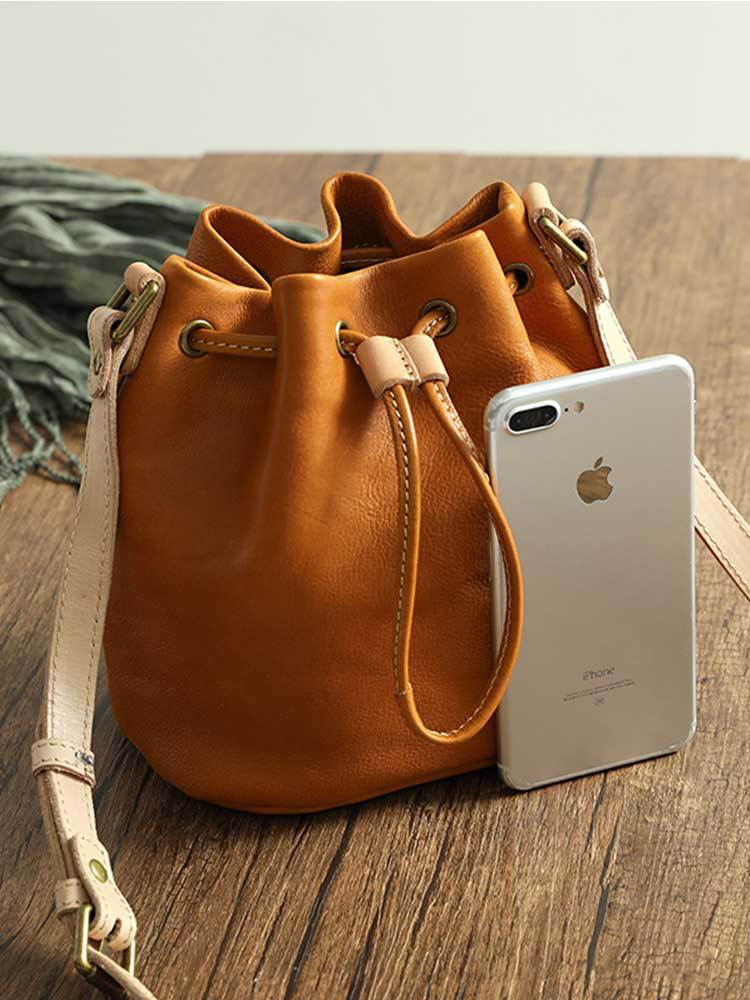 The Cinch Suede Shoulder Bag  |  Womens Shoulder Bags Handbags LIGHT GOLD